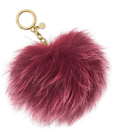 are michael kors pom pom real fur